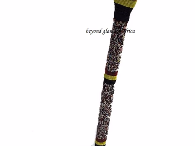 A customize multi colored beaded walking stick