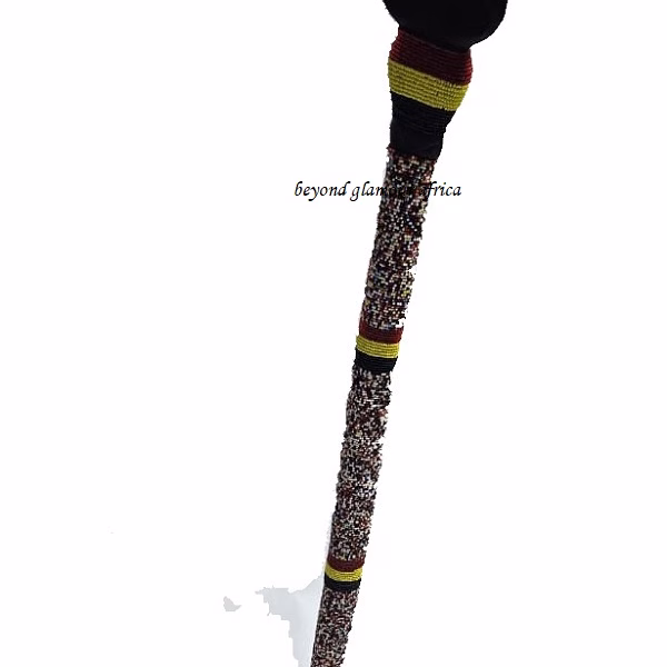 A customize multi colored beaded walking stick