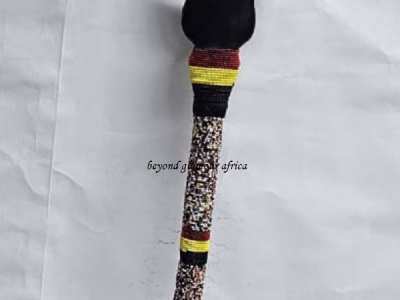 A customize multi colored beaded walking stick