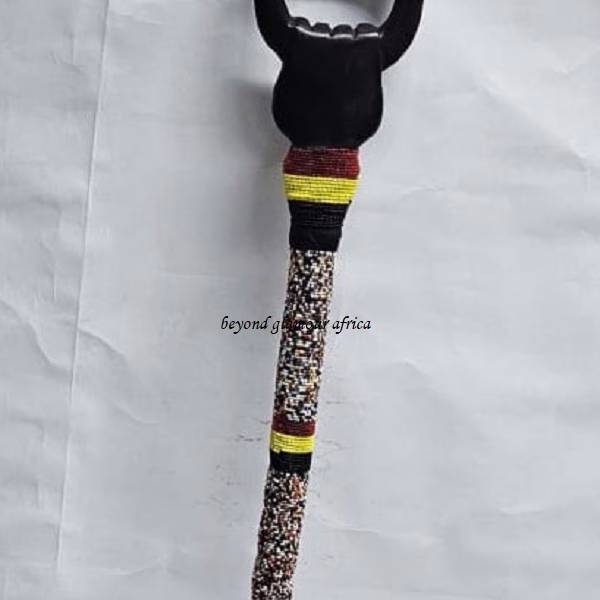 A customize multi colored beaded walking stick