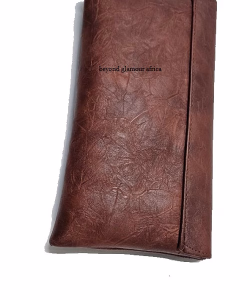 Ladies brown leather clutch bag very fashionable to have