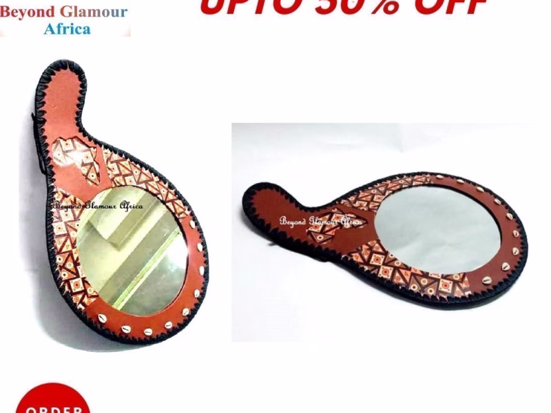 A brown leather mirror very fashionable to have