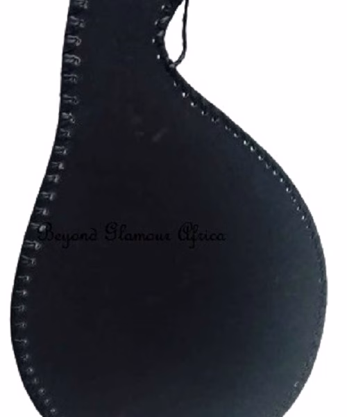 A brown leather mirror very fashionable to have