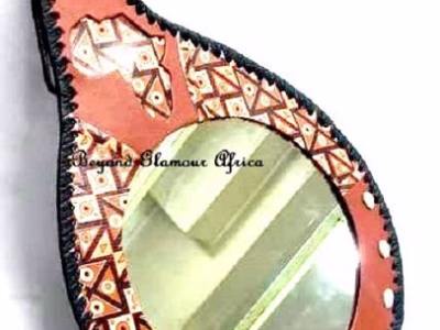 A brown leather mirror very fashionable to have