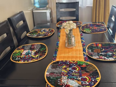 Customised table mats, runner and cup cup coasters.