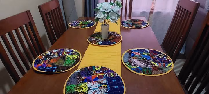 Customised table mats,runner and cup coasters.