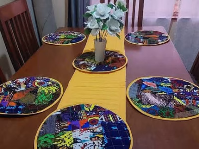 Customised table mats, runner and cup cup coasters.