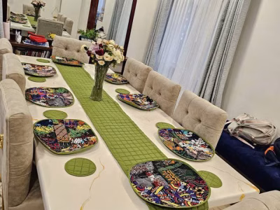 Customised table mats, runner and cup cup coasters.