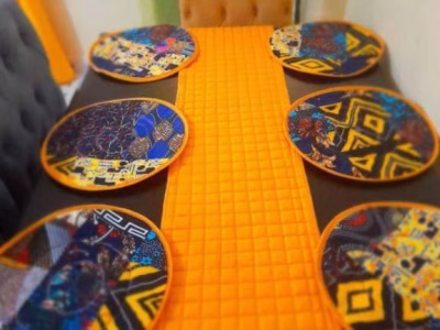 Customised table mats,runner and cup coasters.