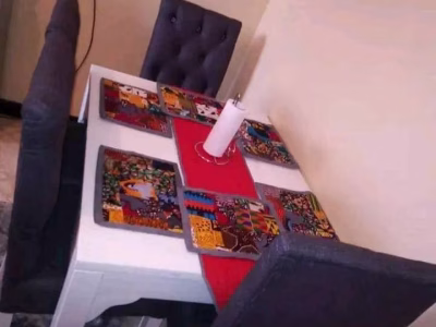 Customised table mats, runner and cup cup coasters.