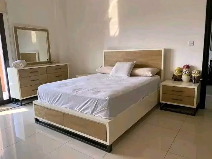 King size Bed, with mattress, dresser and side drawers.