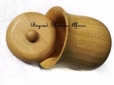 A wooden sugar dish