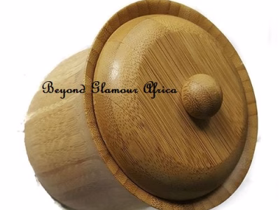 A wooden sugar dish