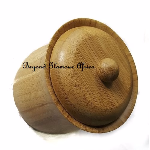 A wooden sugar dish