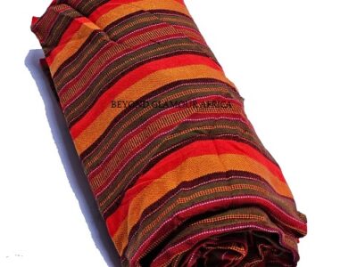 A black and red sling bag and an orange and brown maasai combo