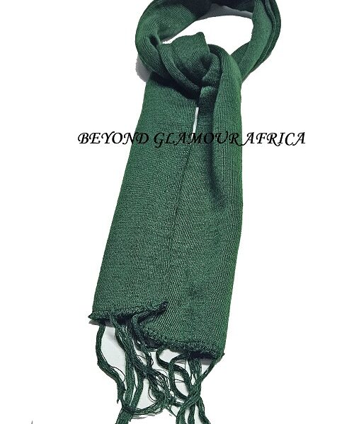 A green knitted scarf very fashionable and durable to have
