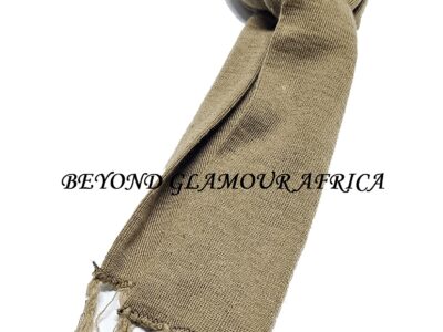 A brown knitted scarf very fashionable and comfortable to have