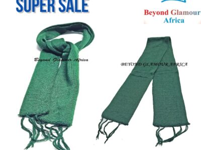 A green knitted scarf very fashionable and durable to have