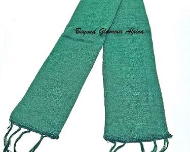 A green knitted scarf very fashionable and durable to have
