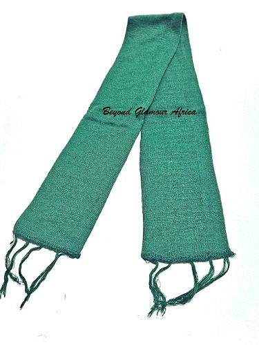 A green knitted scarf very fashionable and durable to have