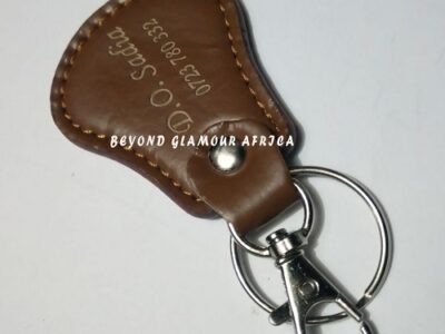 A brown cowboy hat and a brown keyholder combo