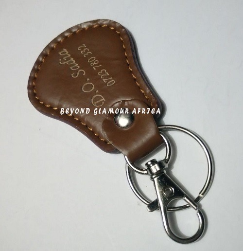 A brown cowboy hat and a brown keyholder combo