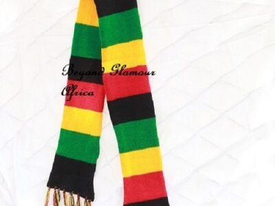 A multicolored knitted scarf and a yellow bracelet combo